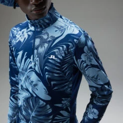 J.Lindeberg Emanuel Print 1/4 Zip Golf Sweater -FootJ Golf Club Shop J.Lindeberg AW22 Emanuel Print Mid Layer GMJS07417 0470 SWLIN088 Hibiscus BlueNavy PeonyWhite Model 2