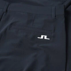 J.Lindeberg Cuff Jogger Golf Trouser -FootJ Golf Club Shop J.Lindeberg SS22 Cuff Jogger Golf Trouser JL Navy White GMPA05574 6855 Code TRLIN020 34 W Reg Leg Detail