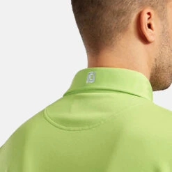 FootJoy Stretch Pique Solid Golf Polo Shirt 12 FootJoy Stretch Pique Solid Golf Polo Shirt -FootJ Golf Club Shop footjoy pique ss shirt ath 91818 lime Model 2
